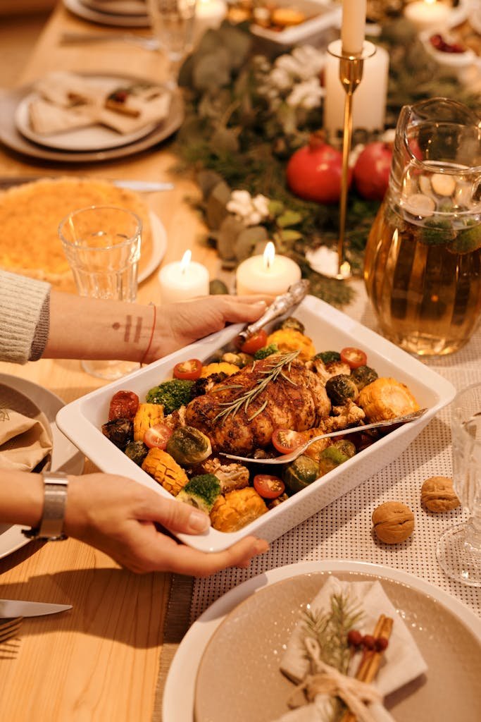 Christmas Roast Chicken Warm, inviting holiday table setting with roasted chicken and Christmas decor.